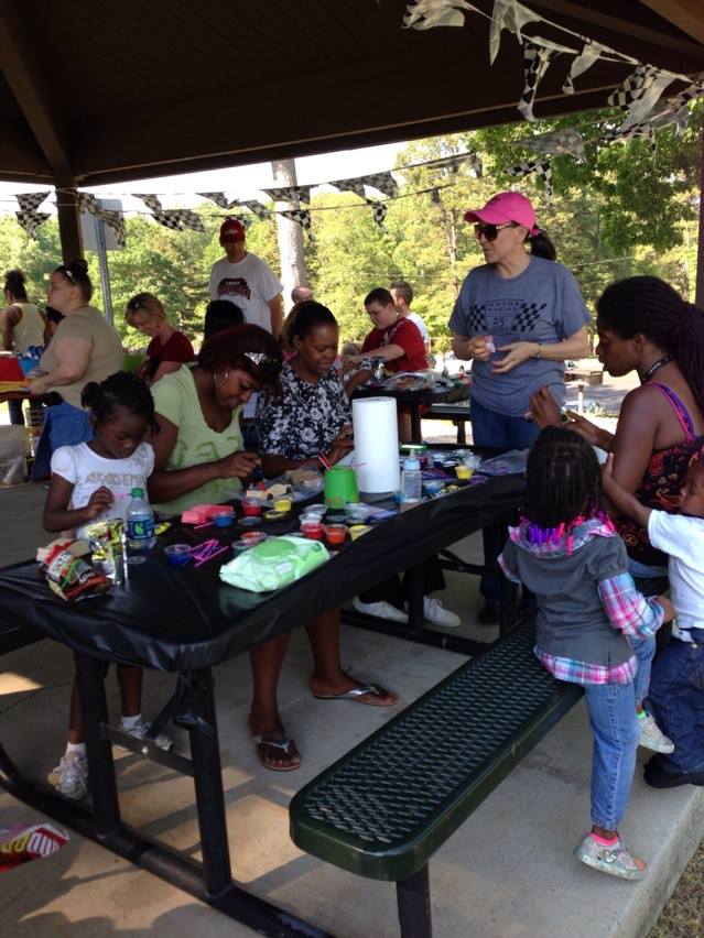 Mother, daughters and grandchildren share this day together.